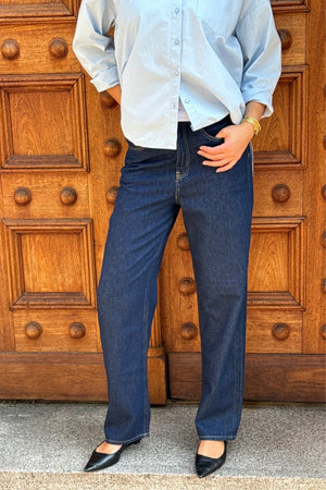 El rendimiento original de los jeans anchos - mezclilla azul oscuro