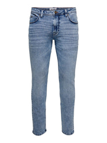 Jeans delgados de la vida de telar - mezclilla azul