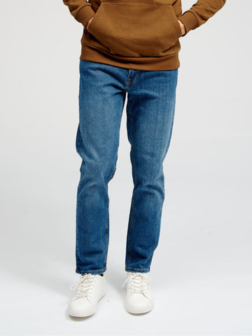 Los jeans de rendimiento originales (regulares) - mezclilla azul mediano