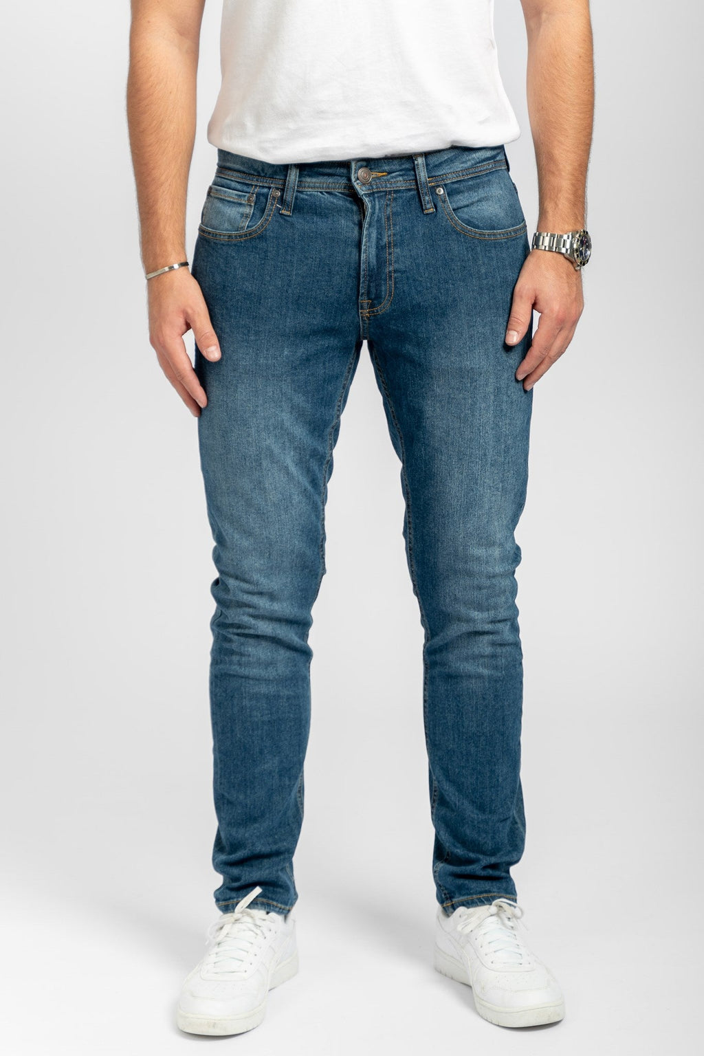 Los jeans de rendimiento originales (delgados) - mezclilla azul medio